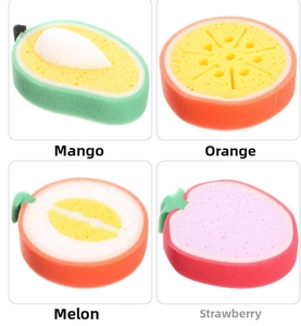 Detailed view of four fruit-shaped sponges including mango, orange, melon and strawberry