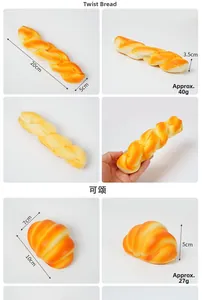 Detailansicht realistischer PU-Schaumgebäck-Modelle aus Croissant und Hefezopf für Fotos