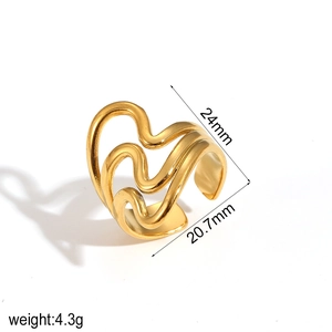 Detail view of gold wave ring with dimensions 24mm by 20.7mm and 4.3g weight