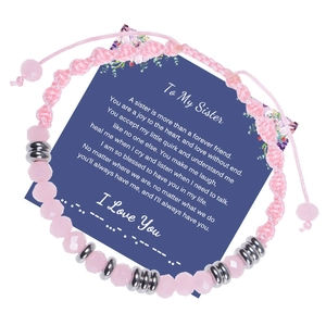 Detail of Morse code bracelet with pink crystal beads on sentimental message gift card