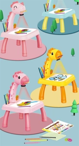 Close-up of kids deer projector drawing table with colorful pens and drawing books