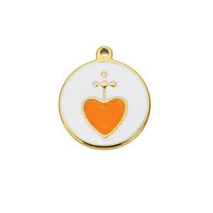 Close-up of a gold round pendant with orange heart and white enamel finish