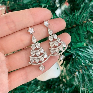 Elegant silver Christmas tree earrings with sparkling zircon stones and star detail