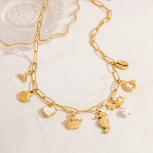 18K gold plated stainless steel paperclip necklace with shell, seahorse and star charms