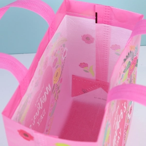 Pink Happy Mother's Day non-woven gift bag with flower prints and top handle