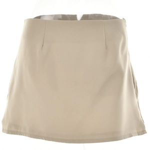 Detailed view of high-waisted beige mini skirt with a sleek A-line fit and smooth fabric