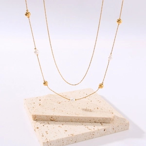 Double-layer 18K gold plated necklace with elegant white pearls and metallic beads