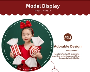 Detail of red and white striped giant candy prop with bow for festive party decoration
