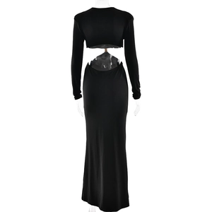 Detailed back view of a black slim fit maxi dress featuring an elegant hollow-out design