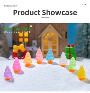 Luminous resin Christmas tree miniatures arranged on snow for holiday DIY landscapes