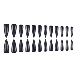 Set of 24 glossy black stiletto press-on nails displayed in organized rows on white background
