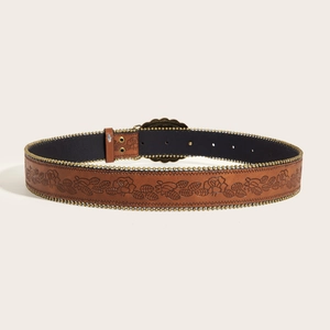 Brown leather belt with embossed floral patterns and metal stud edges on a clean background
