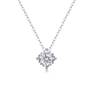 Detail of s925 sterling silver necklace featuring a sparkling round cut moissanite pendant
