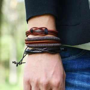 Men's vintage layered leather bracelet set in brown and black with braided cord details