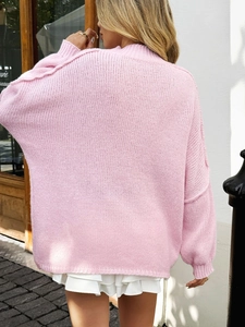 Pink oversized knit sweater with long sleeves and high collar for autumn casual wear
