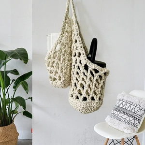 Handmade cream cotton mesh water bottle holder for portable coffee cups or glass bottles