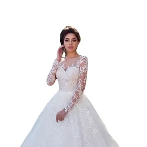 Elegant long sleeve lace wedding dress with white embroidery and floor-length tulle skirt