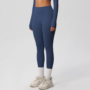Detail view of high-waist navy blue yoga pants with premium double-sided brushed fabric