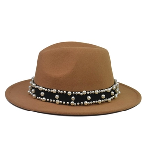 Close-up of camel wool felt fedora featuring a black ribbon band with pearl embellishments