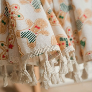 Christmas gingerbread man print curtain with beige cotton linen texture and decorative tassels