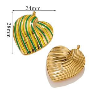 Macro shot of 28mm heart-shaped gold-plated charms with ribbed texture and enamel filling