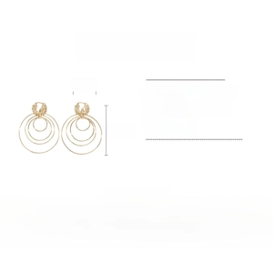 Macro view of geometric multi-layer earrings with crystal studs showing size dimensions
