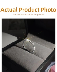 Close-up of sparkling full eternity ring in silver finish presented in a black jewelry box