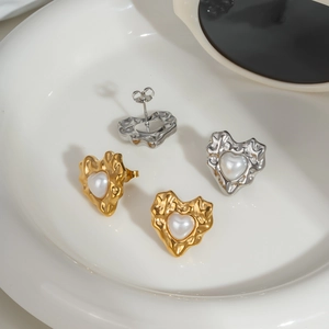 French style oval heart pearl earrings in gold and silver finish with textured metal