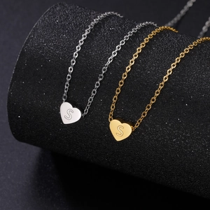 Gold and silver heart initial S pendants on O-chain necklaces made of stainless steel