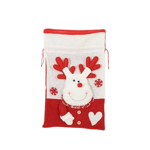 Large knitted Christmas gift bag with festive 3D reindeer design and red drawstring