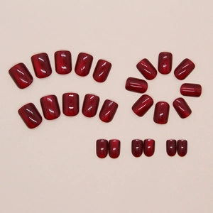 Detail view of 24pcs deep wine red cat eye press-on nails in short square shape