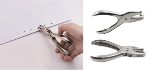 Detail showing hand using a metal single hole puncher for paper binding and DIY tasks