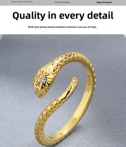 Macro shot of S925 sterling silver snake ring with gold plating and cubic zirconia detail