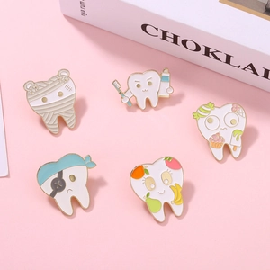 Five cartoon tooth enamel pins set for dentists featuring cute dental healthcare motifs