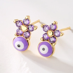 Mini gold-plated evil eye earrings featuring purple zircon flowers and enamel drops