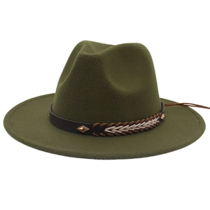 Close-up of olive green wool fedora featuring brown leather band with bronze metal rivets