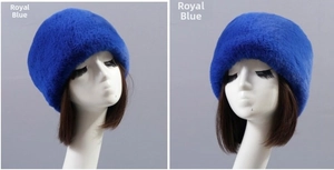 Detailed view of royal blue faux rabbit fur winter hat for elderly women with warm texture