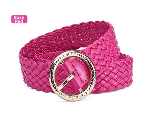 Detail of rose red braided waist belt with gold textured round buckle for women