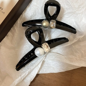Elegant geometric black acrylic hair claw clip with white faux pearl and crystal accent