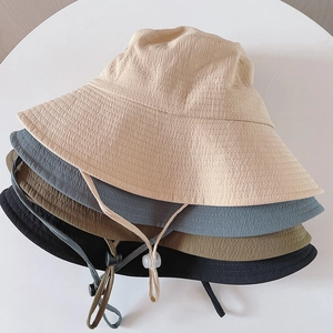 Water ripple textured bucket hats for women in multiple colors with adjustable windproof cord