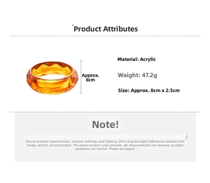 Detail showing amber acrylic bangle with tortoiseshell texture and 2.5cm width specs