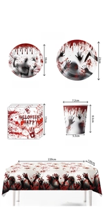 Detailed view of Halloween party tableware set with bloody handprints and scary design