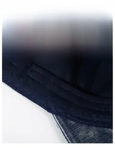 Detail of the widened moisture-wicking sweatband inside the navy cotton baseball cap