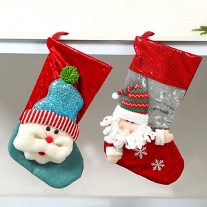 Festive Christmas stocking hangers featuring 3D Santa dolls in vibrant red and green colors