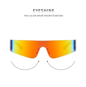 Detail of rimless Y2K sports sunglasses with orange gradient lens and nose bridge support