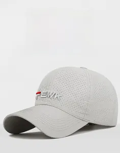Detail of perforated breathable fabric and FEWK embroidery on grey baseball cap