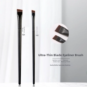 Macro shot of ultra-thin 101 eyebrow and 102 eyeliner brushes with angled synthetic bristles