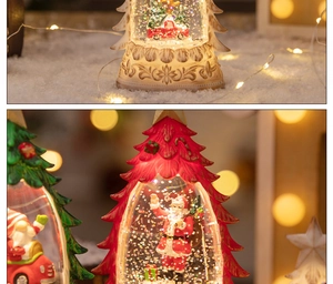 Close-up of glowing Christmas tree snow globe featuring Santa and festive red car scene