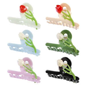 Set of six colorful tulip acetate hair claws in pastel and neutral shades on white background