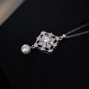Elegant zircon rhombus flower pearl necklace with silver hollowed floral pendant design